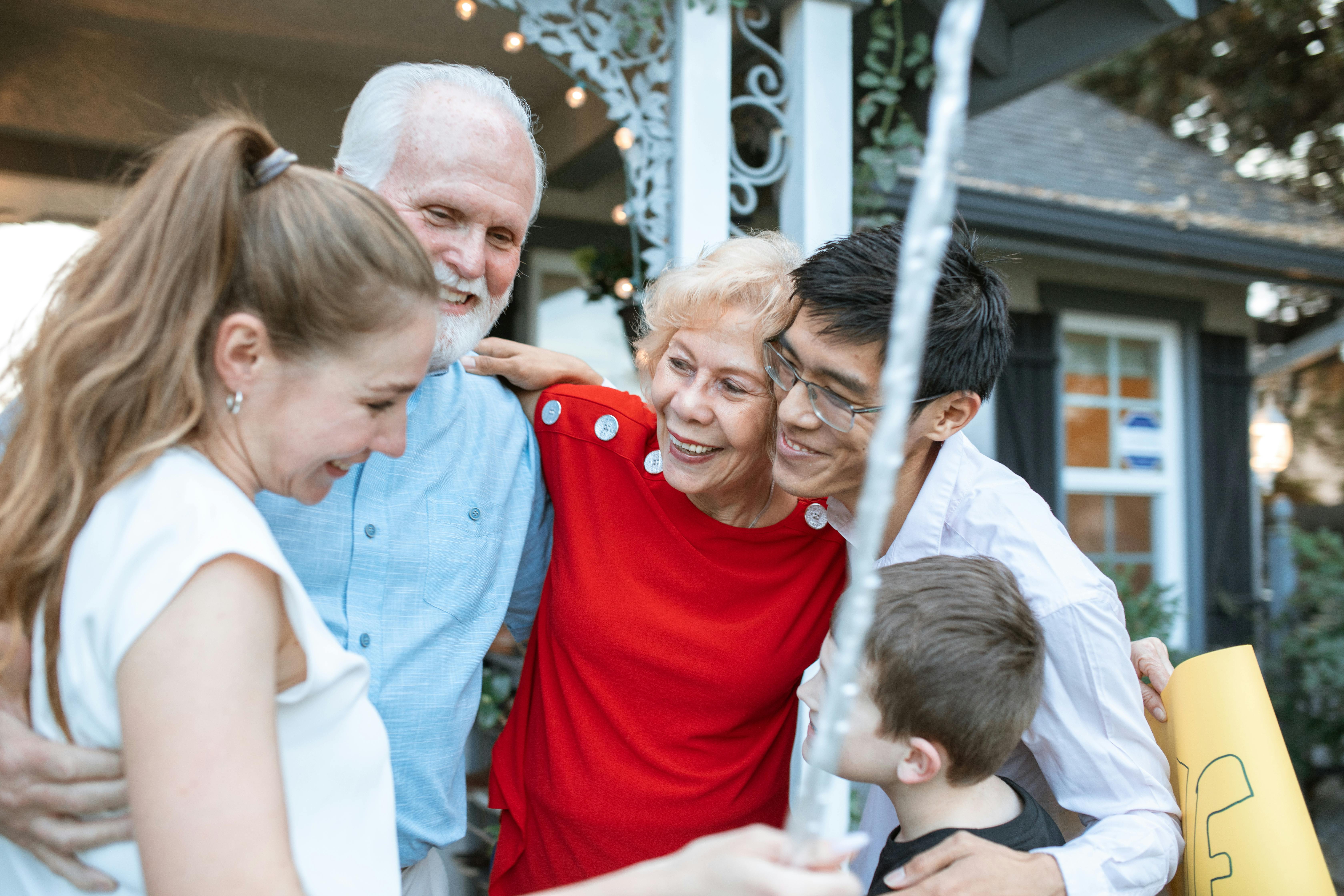 Florida couple reviewing financial documents at a table — examining how Statute 222.14 protects the cash value of a whole life policy from creditors